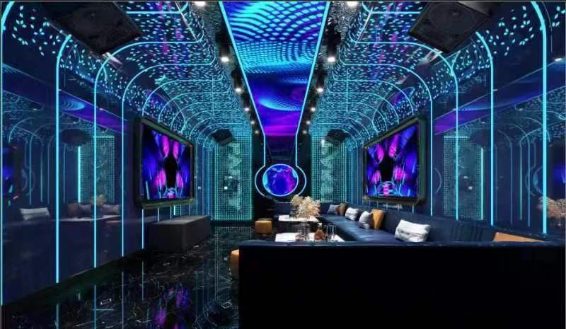Futuristic KTV design reference: Luminous Vault, with layered decorative lighting — additional view 1