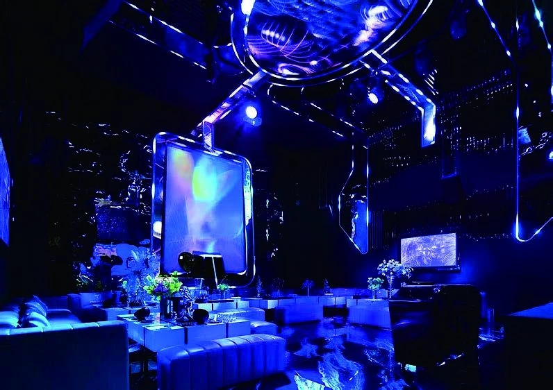 Premium KTV design reference: Violet Reflections, with layered decorative lighting